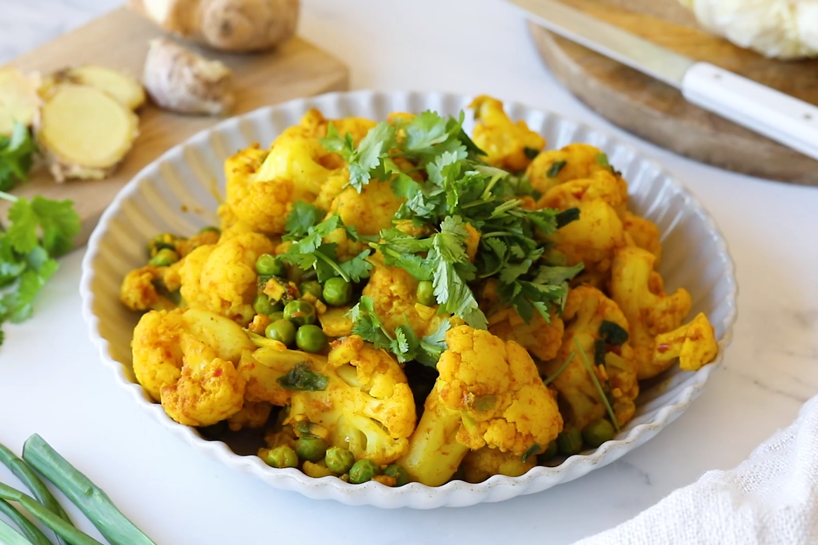 CURRIED CAULIFLOWER AND PEAS